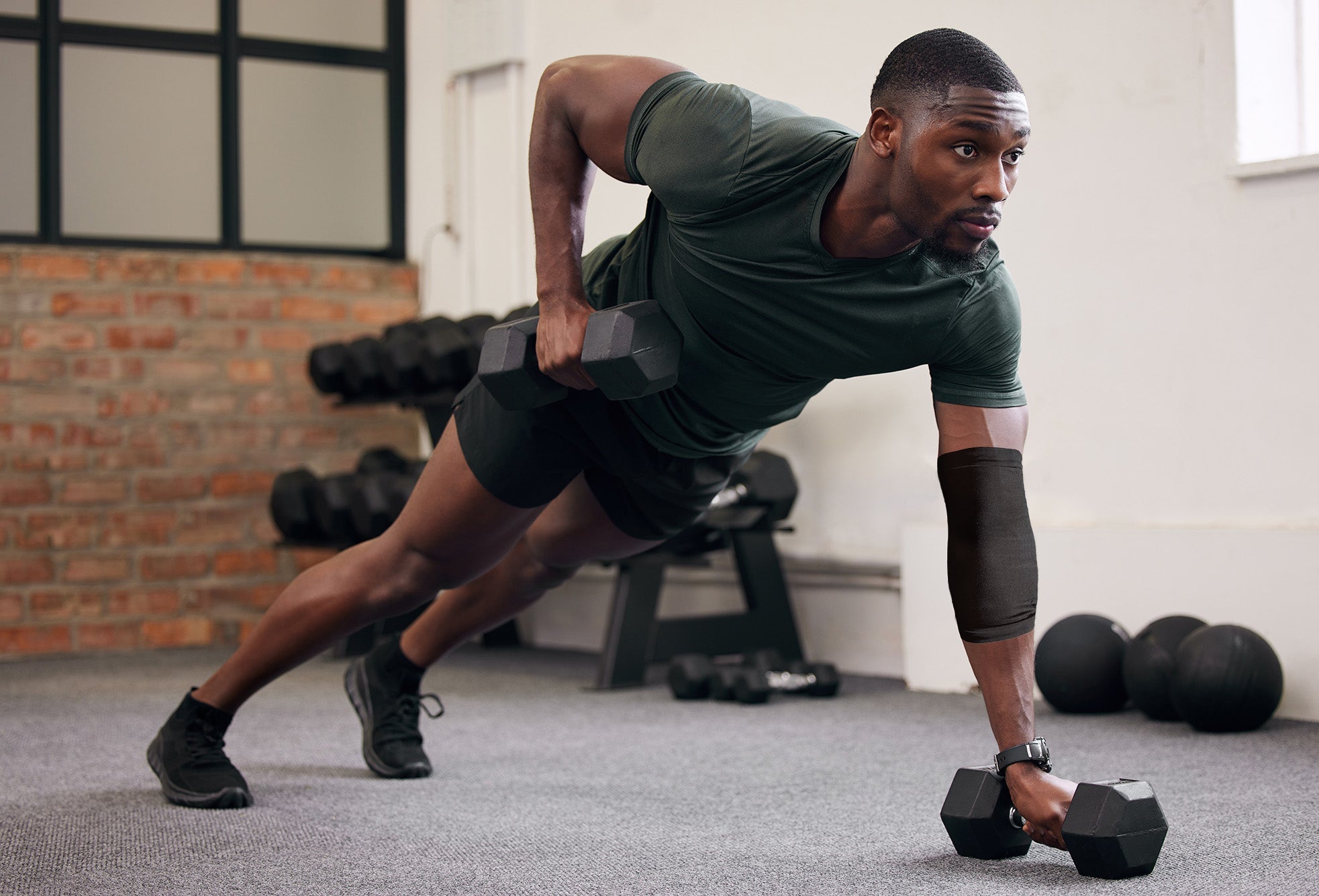 AGOGIE Resistance Band Elbow Sleeve - Men by AGOGIE