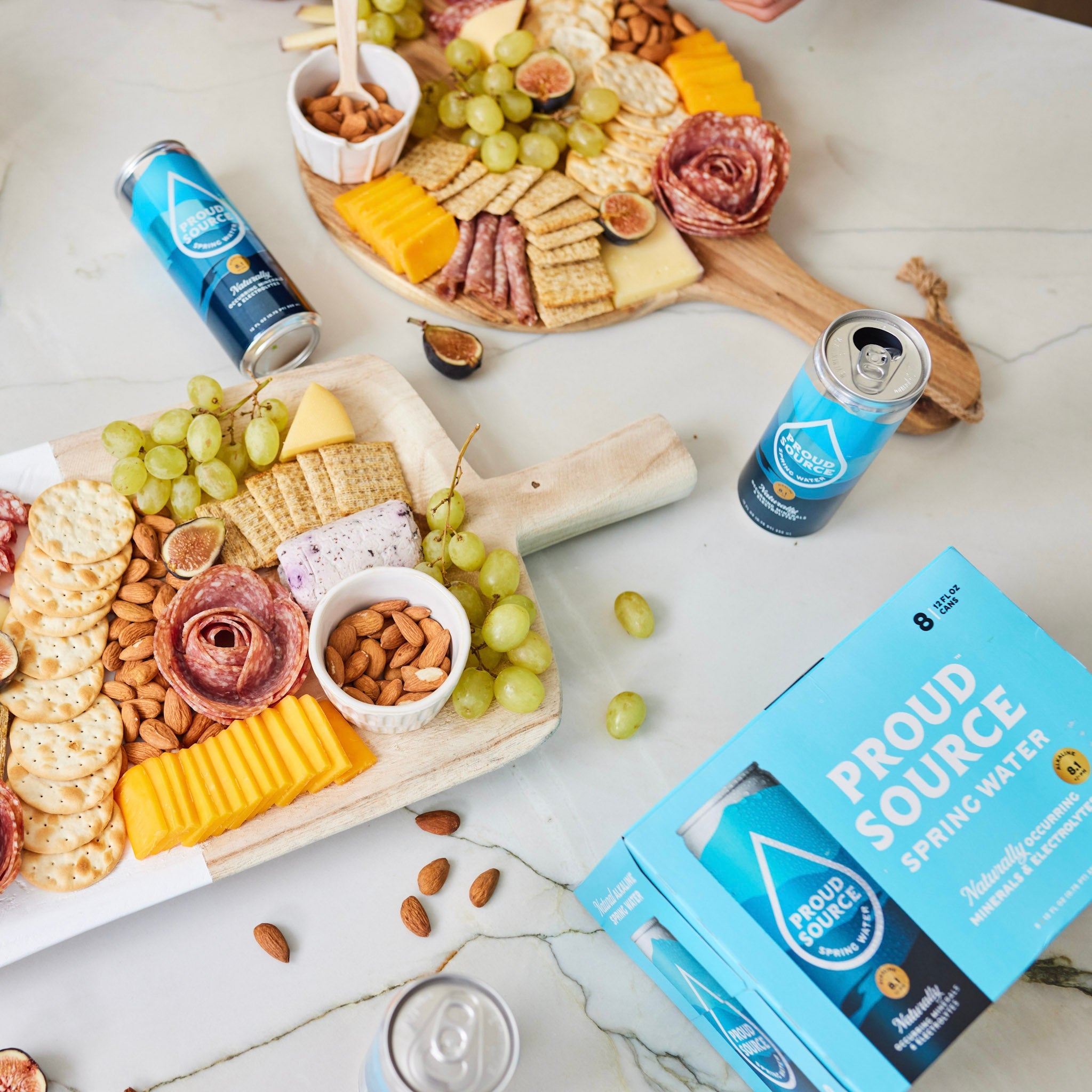 Alkaline Spring Water Cans by PROUD SOURCE WATER